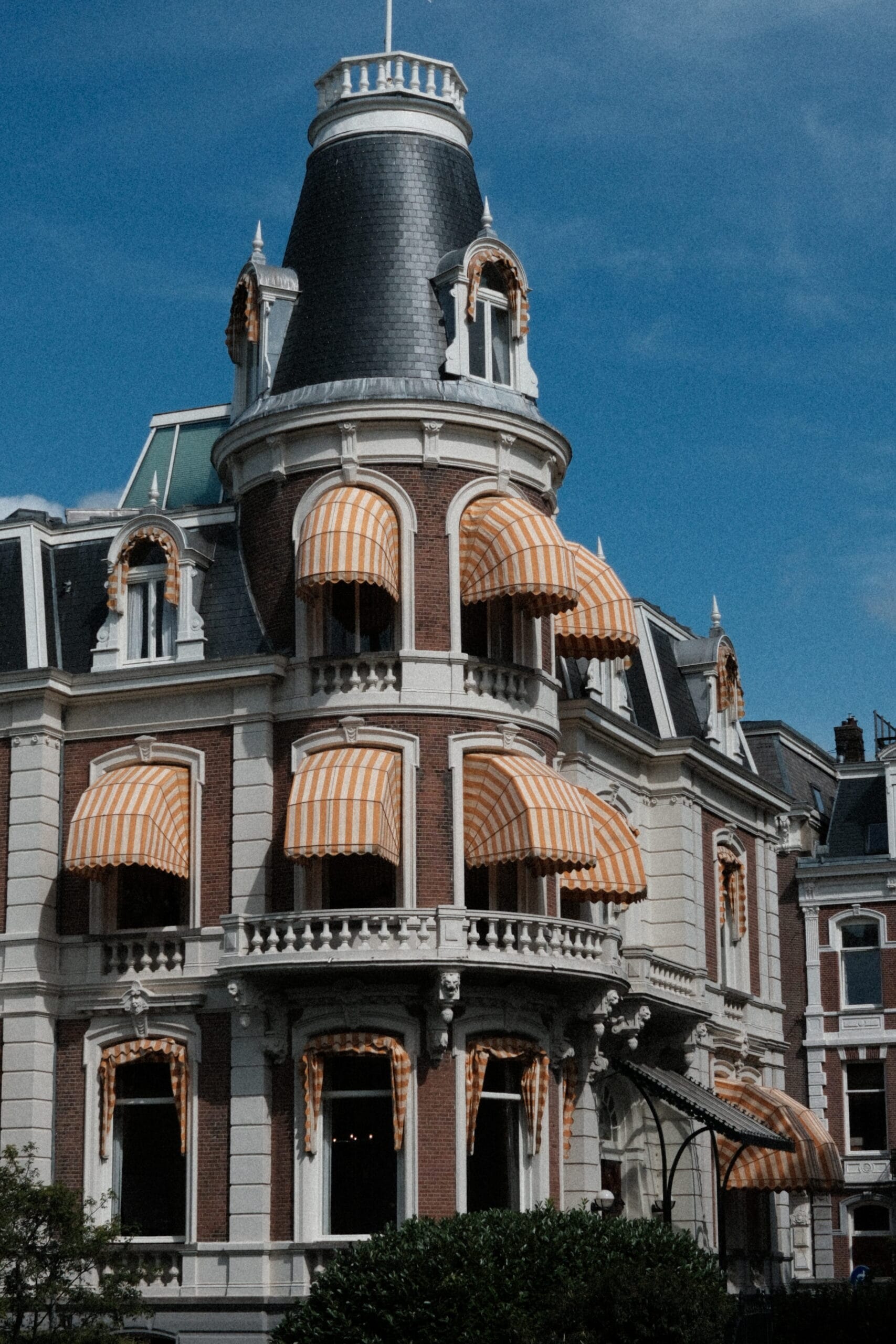 ronde markiezen Amsterdam gevel zonwering